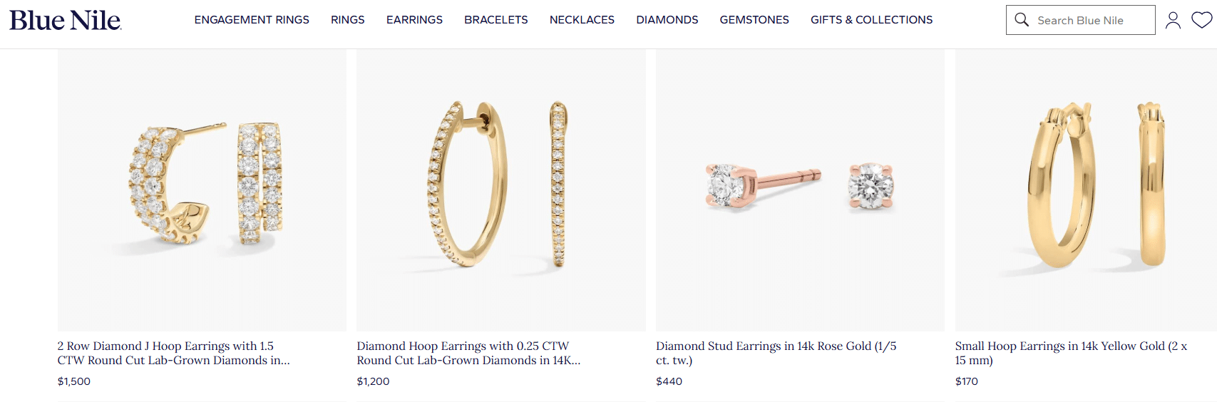 A selection of Blue Nile gold earrings including diamond hoops and rose gold diamond studs, featuring elegant 14K and 18K designs with lab-grown and natural diamonds.